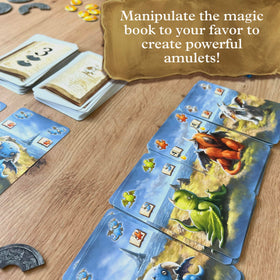 Dragonkeepers cards and small pieces laid out for quick setup and portability.