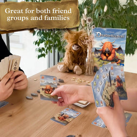 Thames and Kosmos Dragonkeepers players strategize around the table in a tense match.
