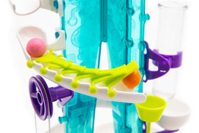 Thames & Kosmos Gumball Machine Maker domino slide demonstrates cause-and-effect fun