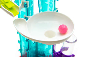 Thames & Kosmos Gumball Machine Maker trampoline segment adds velocity and bounce cues