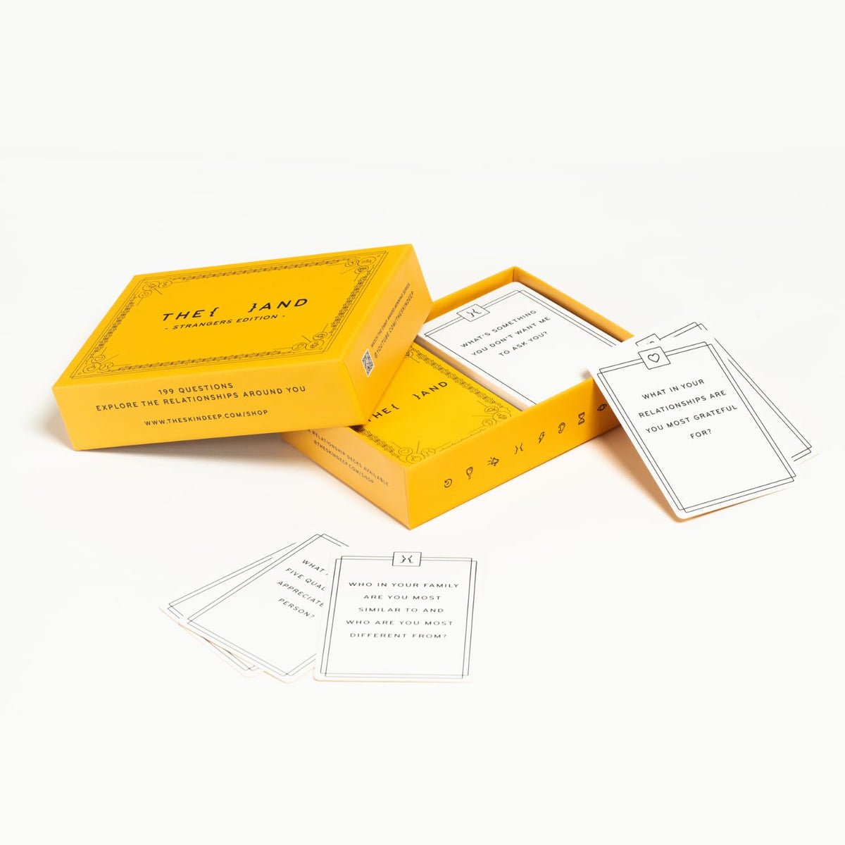 THE AND Strangers Edition cards on table inviting open dialogue.