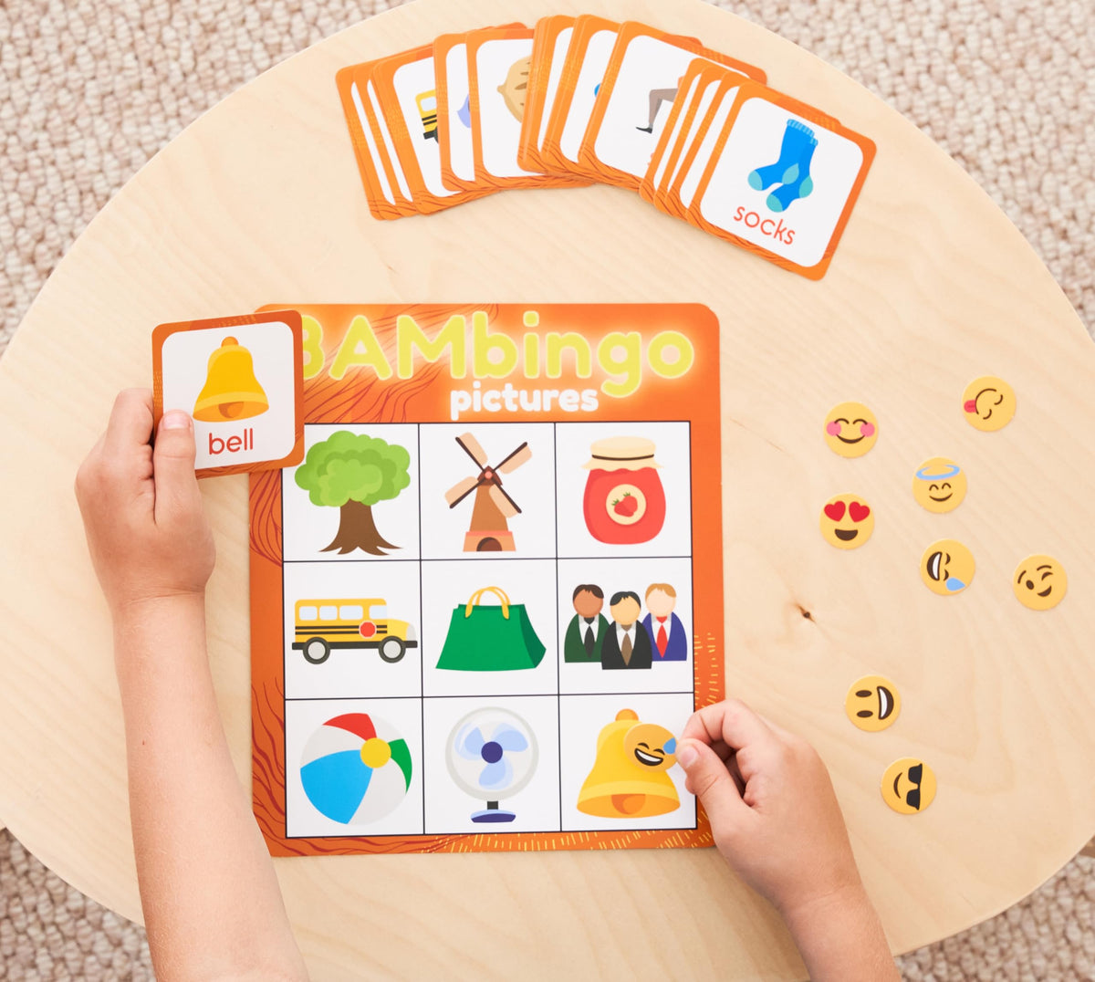 The Bambino Tree Pictures Bingo board uses bright visuals for memory tasks.