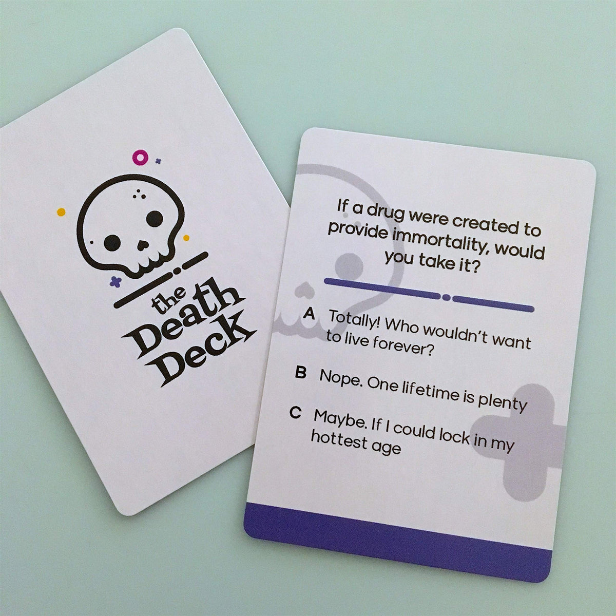 The Death Deck card artwork featuring vibrant illustrations.