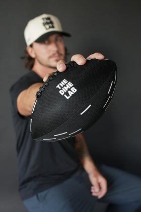 The Dime Lab water football ready to inflate, offering an authentic game feel.