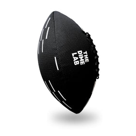 The Dime Lab water football in pool with strong grip design for wet throws.