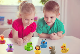 The Dreidel Company colorful 2-inch ducks offer safe, stackable bath-time toys