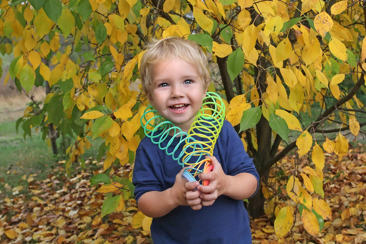The Dreidel Company party toy coil-spring brings simple, colorful fun to events.