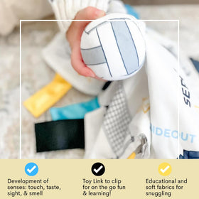 The Learning Lovey sensory blanket offers five-sense play on car trips