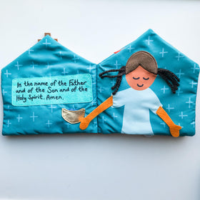 The Little Rose Shop quiet book's interactive activities keep toddlers curious during Mass.