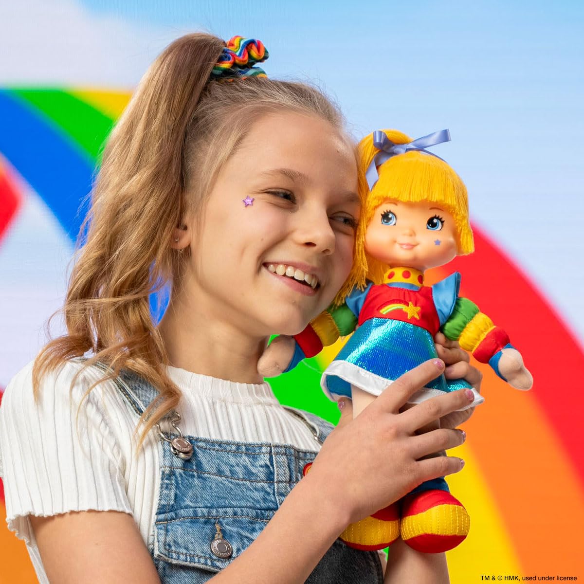 The Loyal Subjects Rainbow Brite doll close-up yarn hair and roto head for tactile sensory exploration.