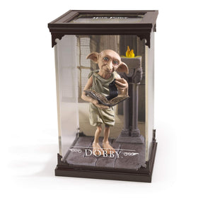 The Noble Collection Dobby diorama with display case highlights magical scene on display.