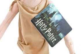 The Noble Collection Dobby Plush face detail highlights features.