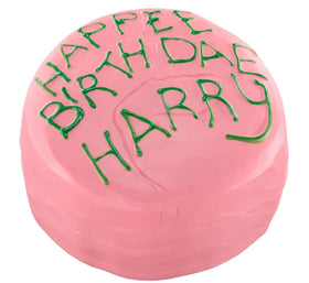The Noble Collection Pufflums Harry Potter birthday cake on display for desk decor and collection.