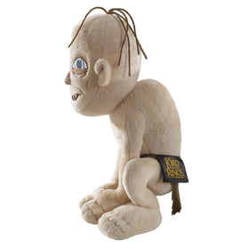 The Noble Collection Gollum plush on a shelf makes a striking display