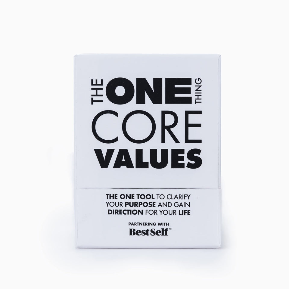 The ONE Thing Core Values Deck in action on a desk for team alignment.