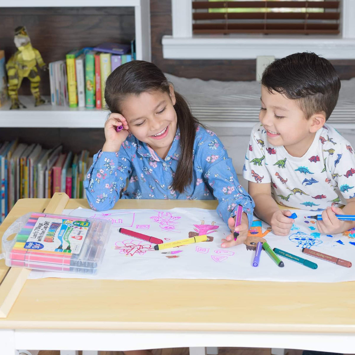 The Pencil Grip Magic Tri Stix in action with kids drawing on the go