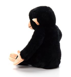 The Petting Zoo chimp plush with wide grin and ears, ready for hugs.