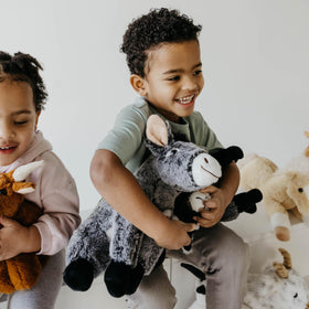 The Petting Zoo donkey plush ears highlight soft kid-friendly design.