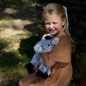 The Petting Zoo donkey plush eyes glow with friendly expression for kids.
