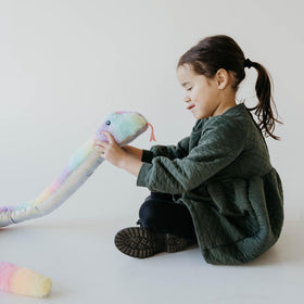 The Petting Zoo rainbow body plush invites bright, comforting play
