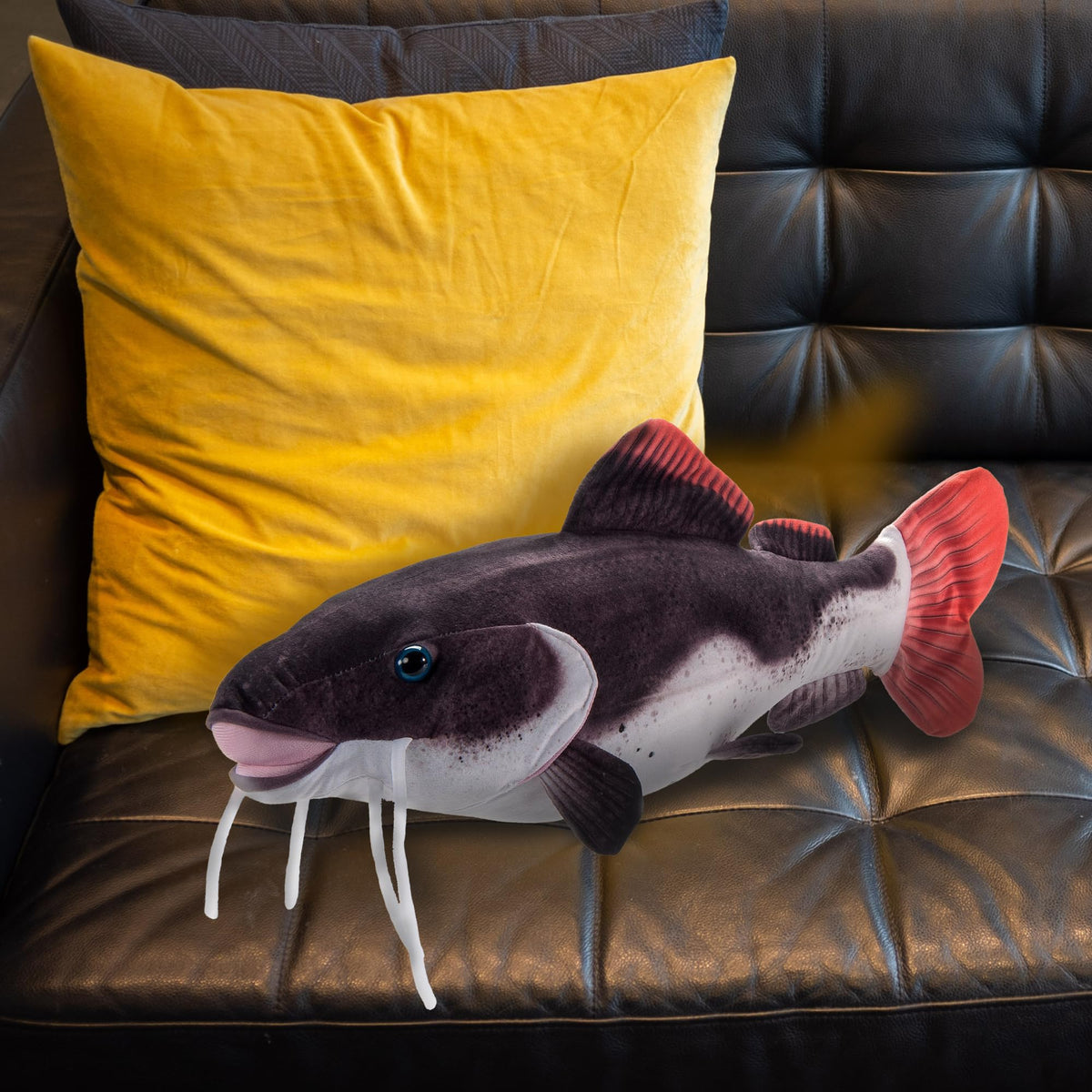 The Petting Zoo purple catfish plush adds ocean-themed fun to stories.