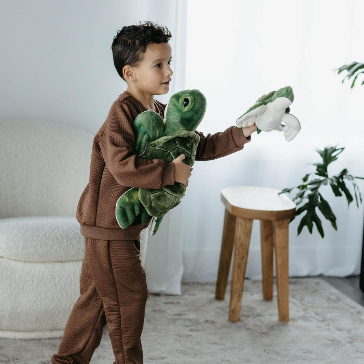 The Petting Zoo sea turtle plush side view, showcasing durable stitching for lifelong hugs.