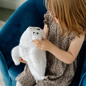 The Petting Zoo seal plush soft fur offers cozy snuggle moments before bedtime.