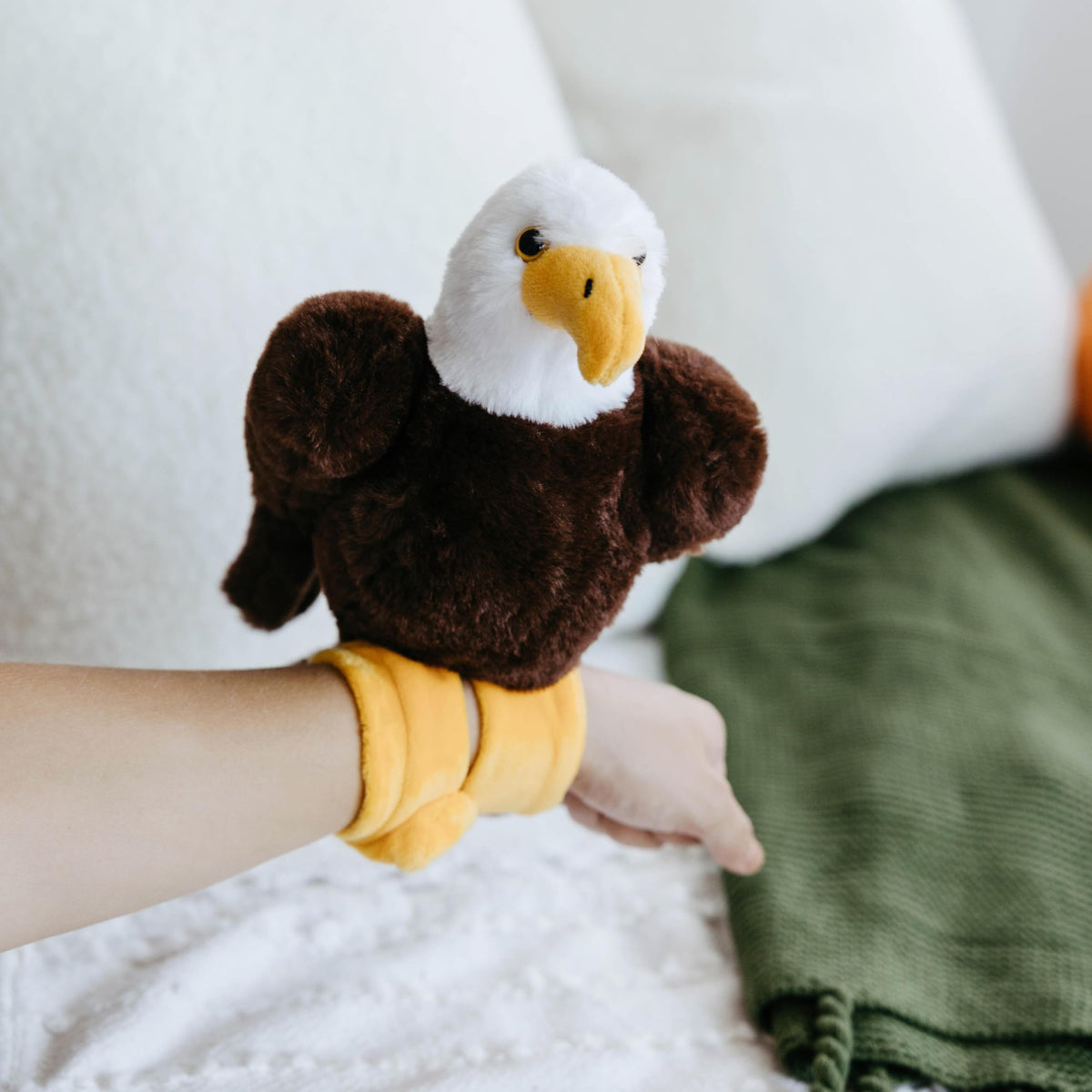 The Petting Zoo slapstix bald eagle plush promoting screen-free fun