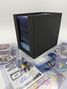 The Rip Buddy desktop-stability unit staying steady on desks during breaks or shows