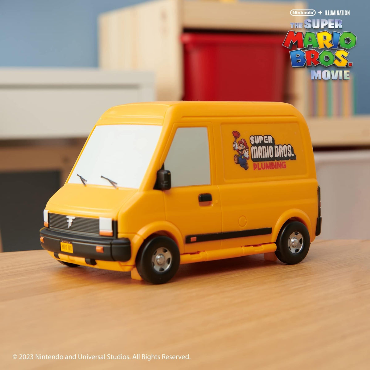 Rolling wheels let kids drive the van and set scenes quickly.