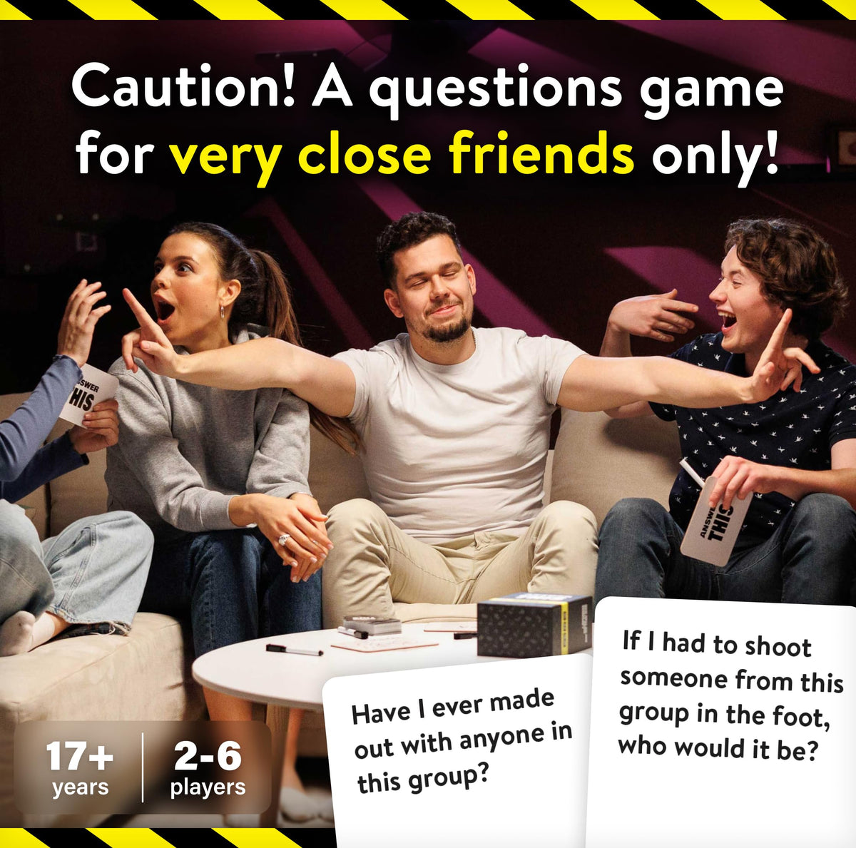 Players gathered around for a humorous game night with The World Game Answer This.