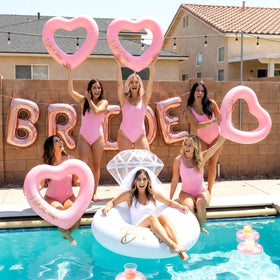 Thenshop pink heart pool float I Do Crew for bridesmaid photo ops