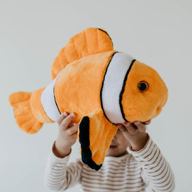 The Petting Zoo clownfish plush showcases lifelike fins and a friendly smile for imaginative play.