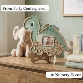 The Real Bossy Baby OneaSaurus guest book frame in green wood adds premium nursery ambiance