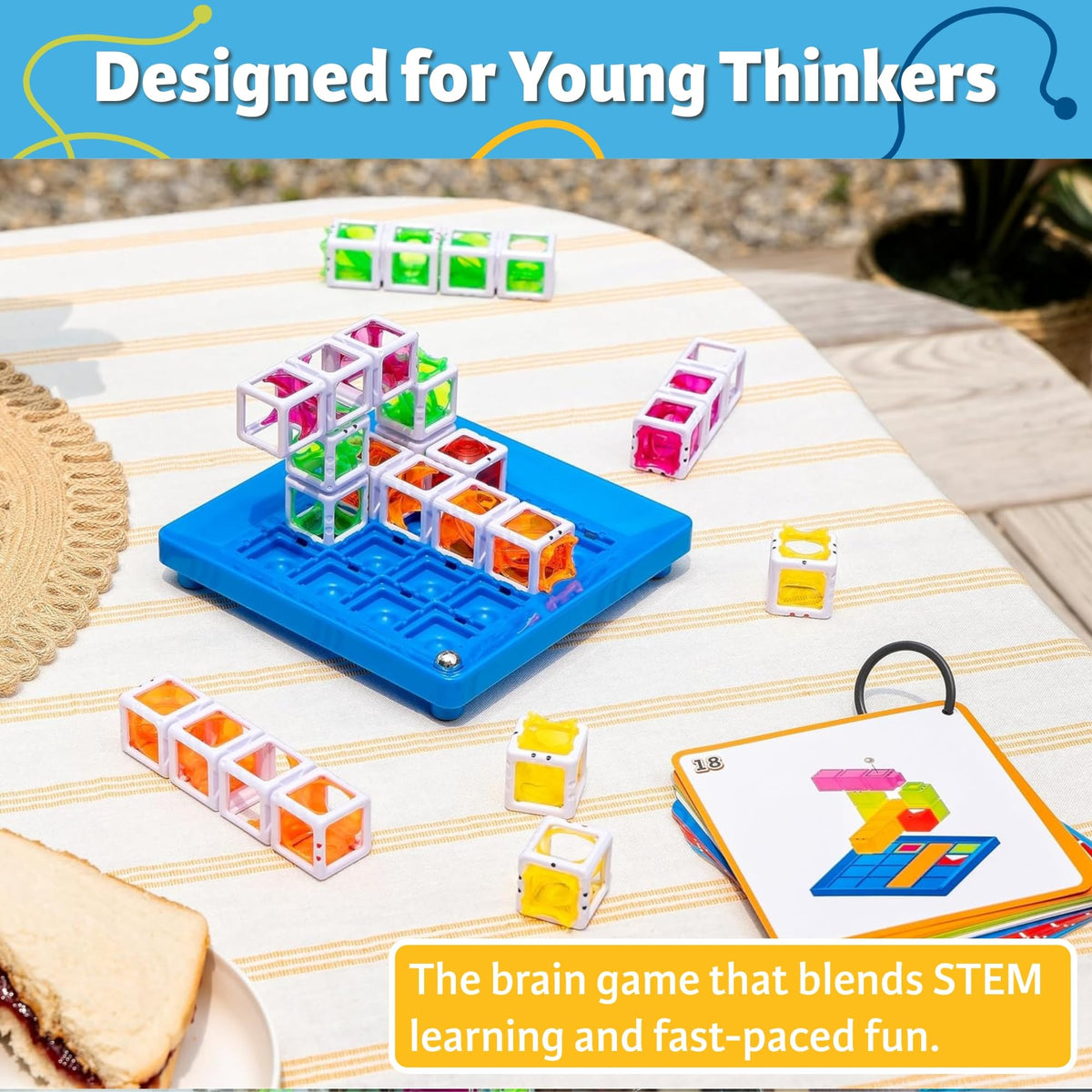 ThinkFun Gravity Maze Builder child assembling a maze encourages independent experimentation.