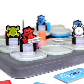 ThinkFun Hacker agent tokens illustrate player roles during problem-solving missions