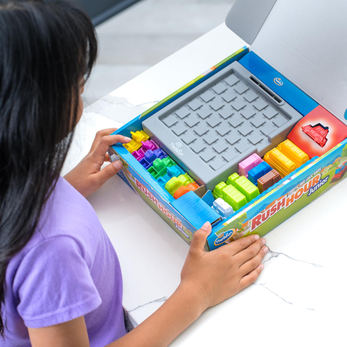 Rush Hour Jr. storage bag keeps pieces organized after play