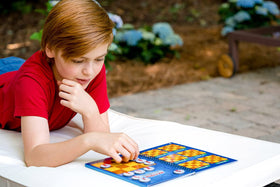 ThinkFun Solitaire Chess Magnetic Travel Puzzle highlighting 120 challenges for growth.
