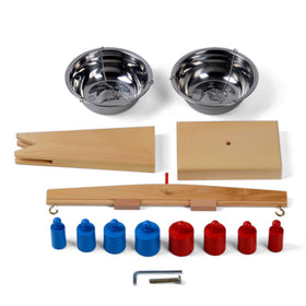 Thoth wooden weighing tool used as versatile classroom teaching aid.
