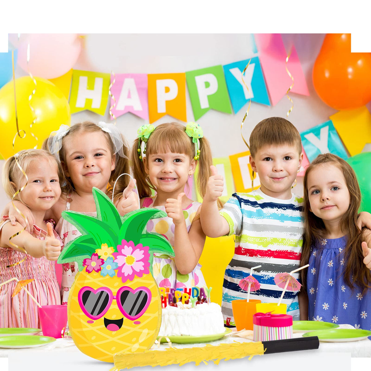 Threan tropical party pinata setup used as centerpiece and backdrop
