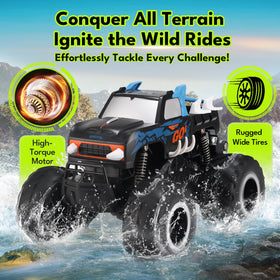 Threeking Monster Truck off-road tires closeup demonstrates strong grip on sand and rocks.