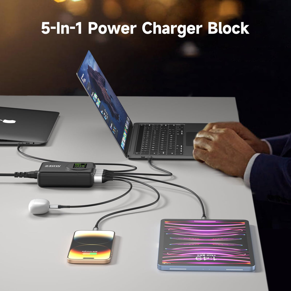 ThunderGo 240W GaN charger in use powering laptop and phone together.
