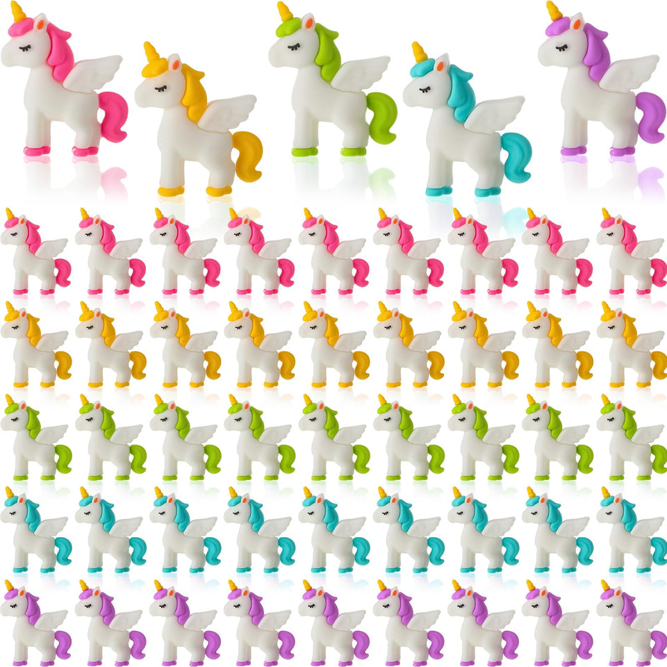 Thyle mini unicorn figurines with wings serve as cake toppers and terrarium accents.
