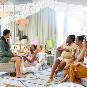 Tiamon baby shower banner white provides simple, festive backdrop
