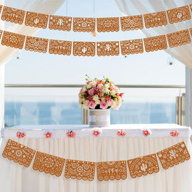 Tiamon cielito lindo banner serving as backdrop at party