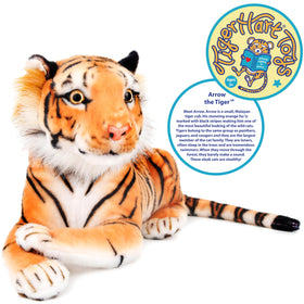TigerHart Arrow tiger plush close-up showing orange fur and stripes.