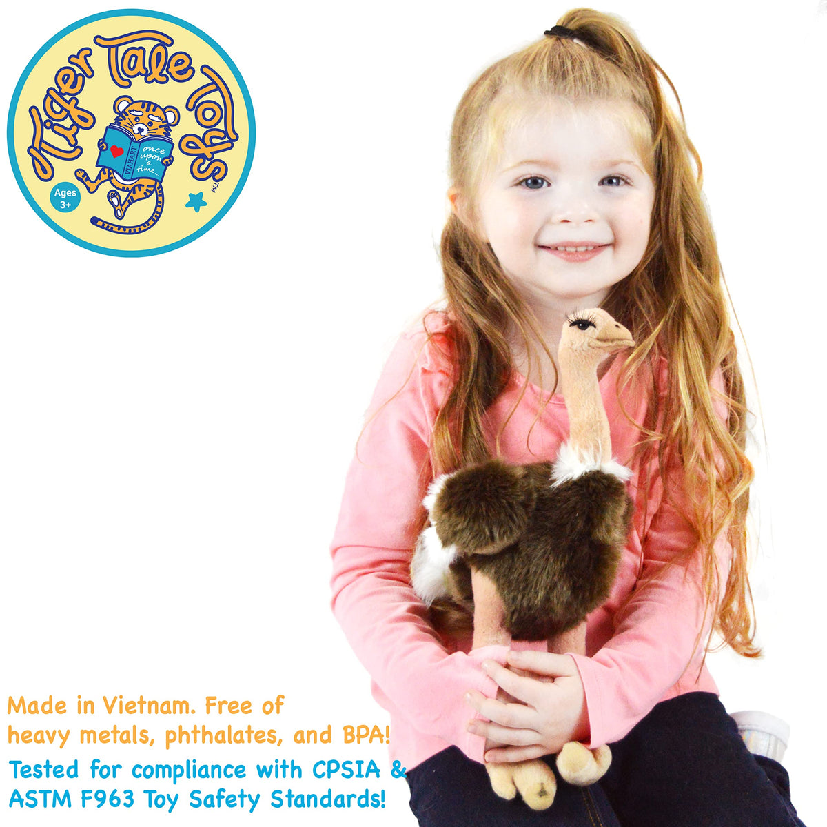 TigerHart Ola ostrich plush side view, sturdy stand for storytelling.