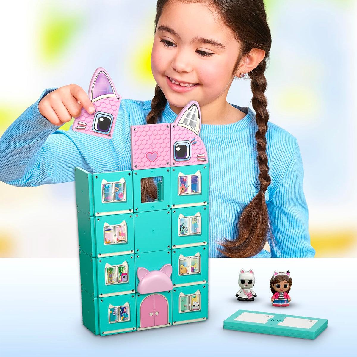 Tile Town Gabby’s Dollhouse action tiles capture motion for interactive storytelling adventures.