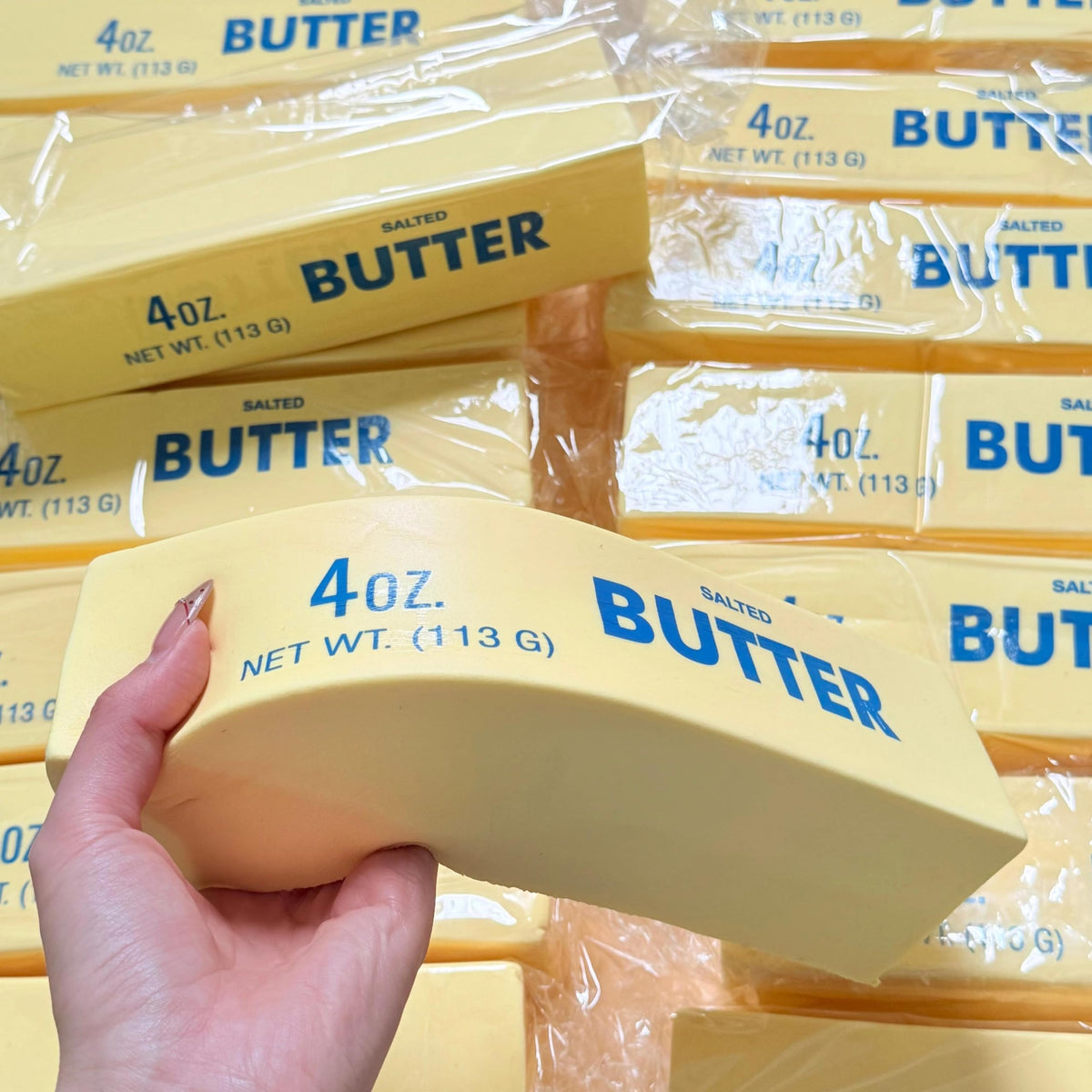 TIM CHESS 9.5 inch giant butter squishy in view for immersive squeeze and focus aid
