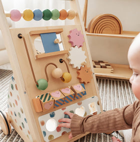 Tiny Land walker in use demonstrating 2-in-1 function